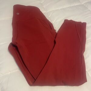 Lululemon rust color align with pockets, size 6